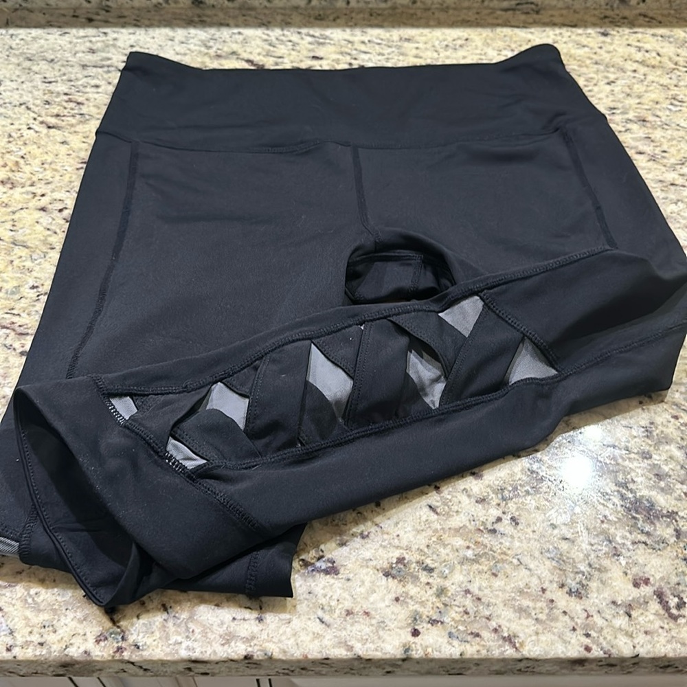 Like New Womens Capri Athletic Leggings with Braided & Scalloped Trim on Legs.